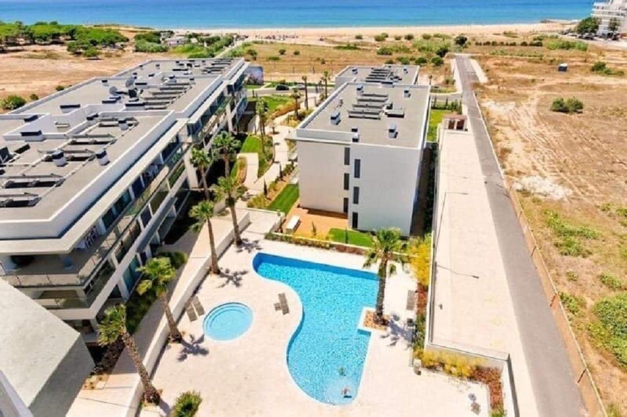 Apartamentos Cavalo Preto Beach Resort Картейра Экстерьер фото